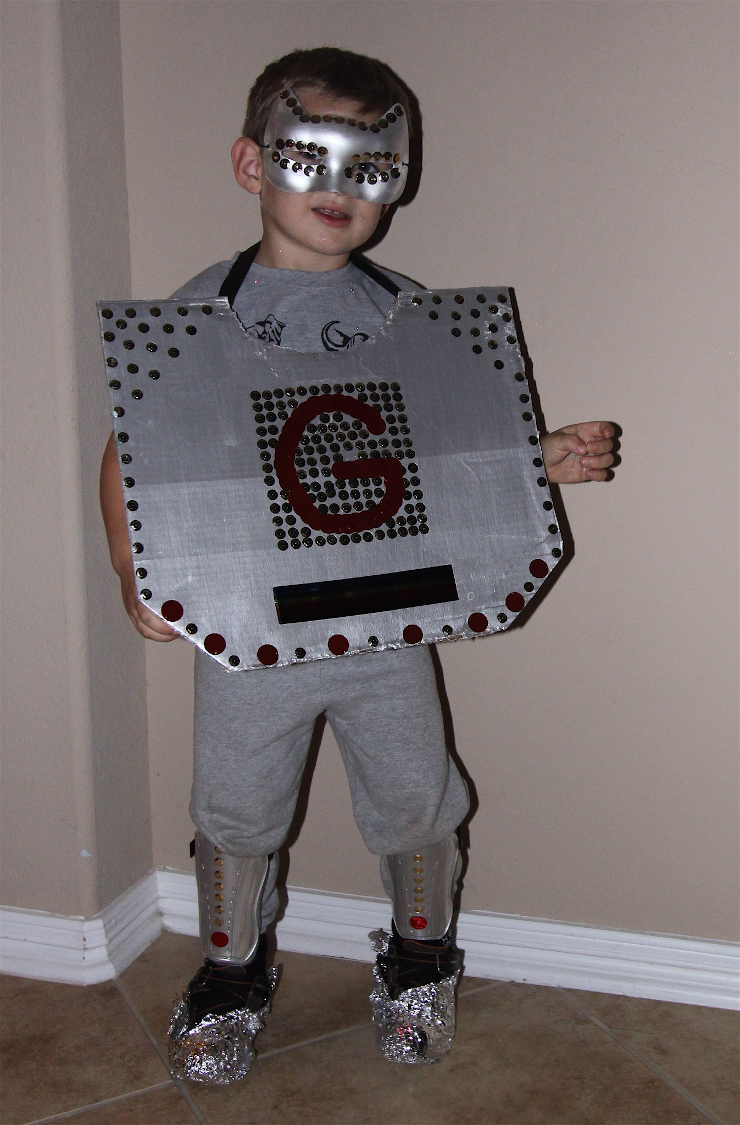 A child wearing a homemade robot costume